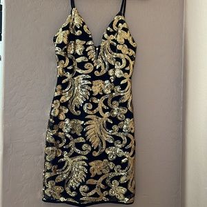 Mini-dress w/ a deep V in front.